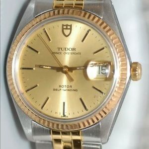 Men’s gold Rolex Watch